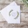 "Beauty is the promise of happiness" note card with watercolor wreath. Staged on distressed wood background with eucalyptus leaves.