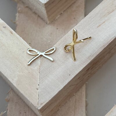 Topped With A Bow Gold Earrings