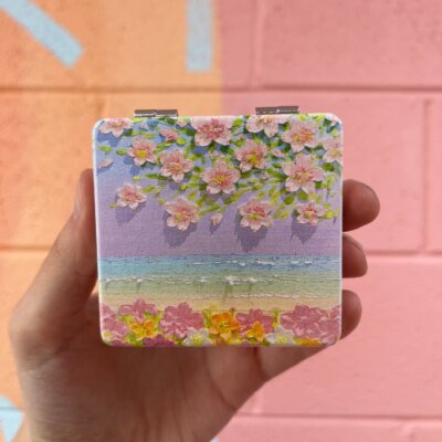 Tropical Compact Mirror