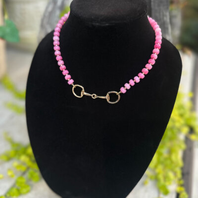 Pink beaded necklace with gold bit clasp