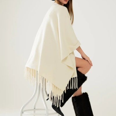 Soft Knitted Poncho in Beige with Fringe